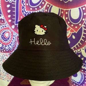 Hello kitty hat. Hand stitched. Polyester hat. Crown measurement: 22.8 in